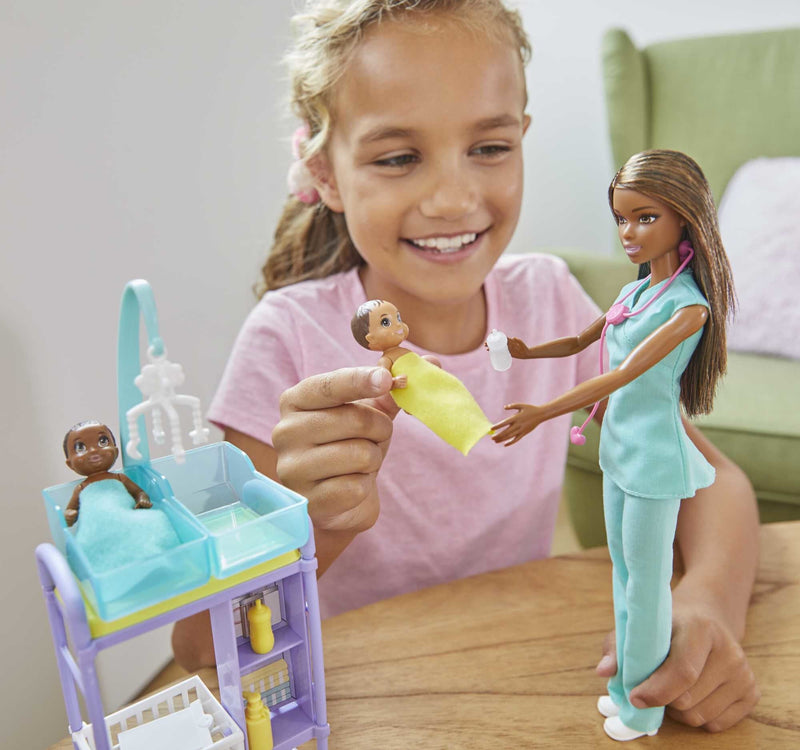 Barbie Career Baby Doctor Playset with Brunette Doll, 2 Infant Dolls, Exam Table and Accessories, Stethoscope, Chart and Mobile for Ages 3 and Up